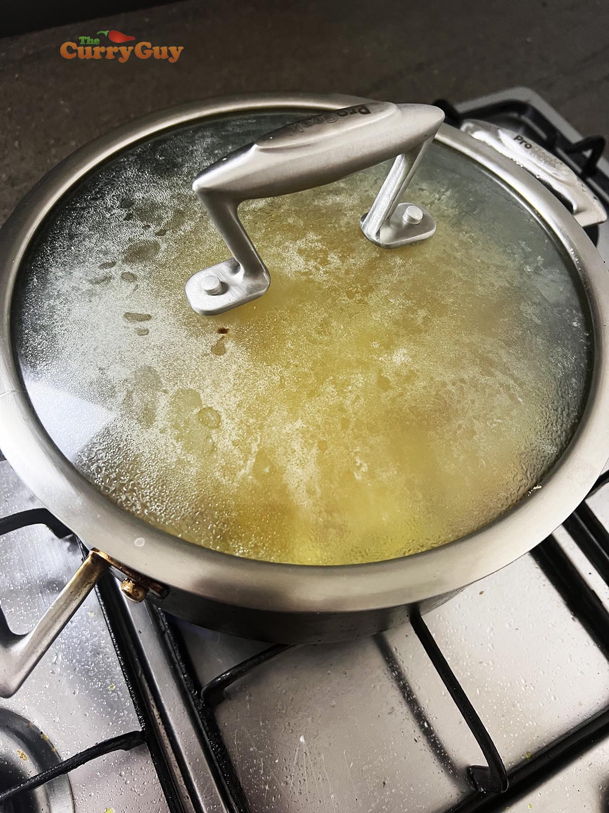 Covering the pan for a 30 minute simmer