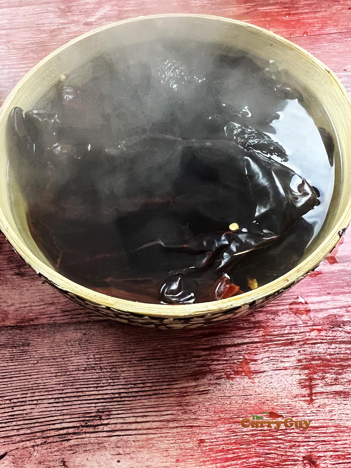 Soaking the dried chilies to rehydrate.