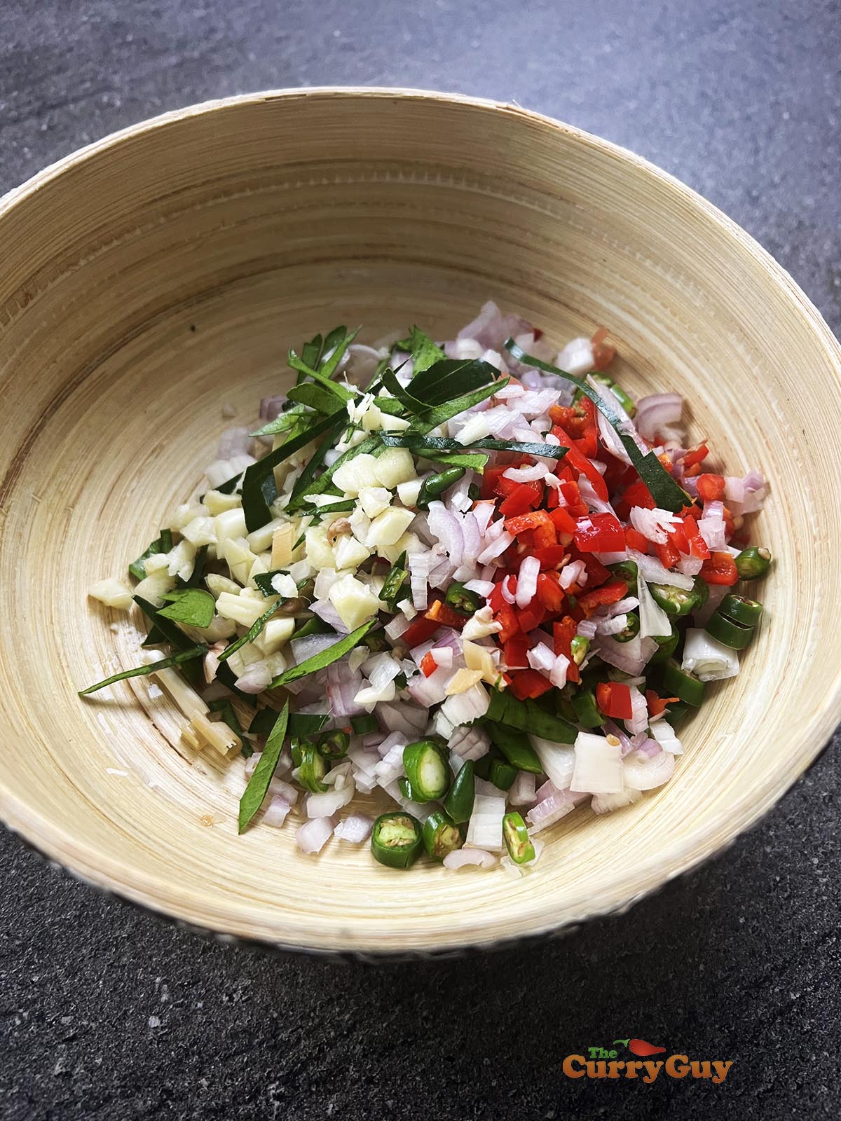 Sambal matah ingredients mixed together.
