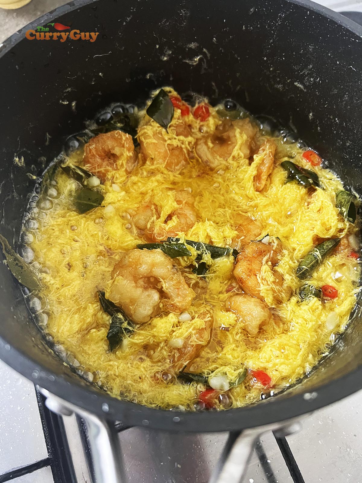 Adding the prawns to the butter floss.