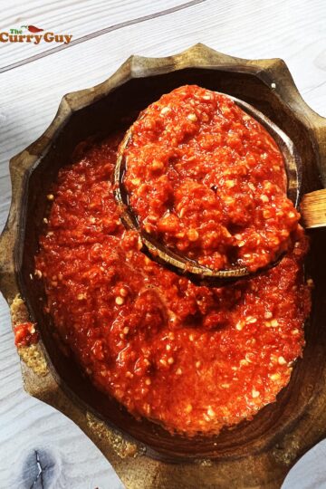 finished sambal oelek recipe in a wooden serving bowl.