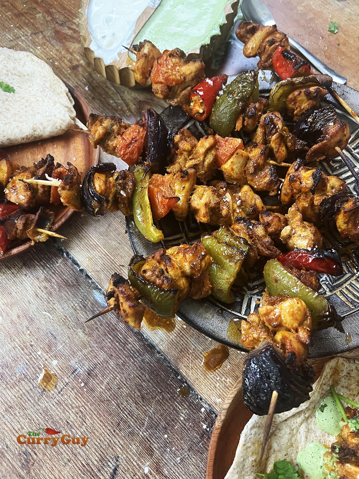 Finished sheet pan chicken tikka and vegetables.