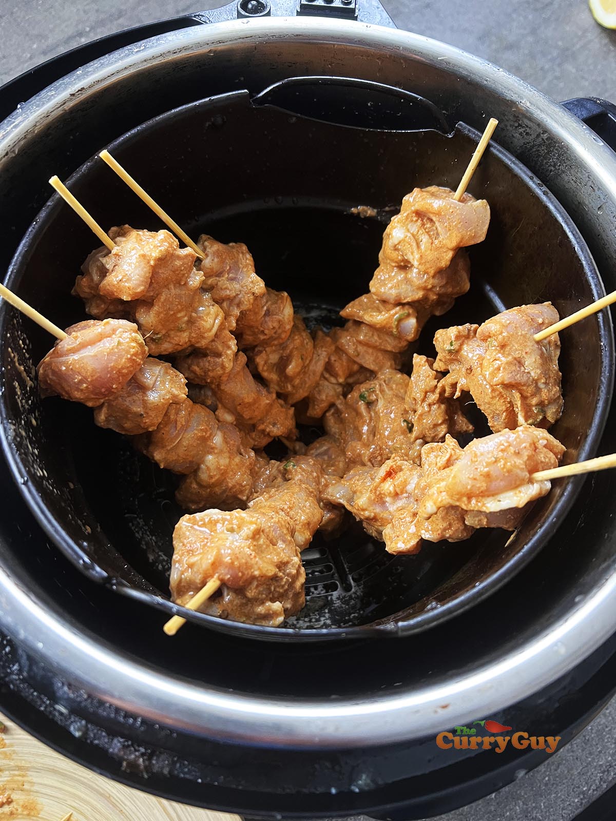 Skewered chicken in air fryer.