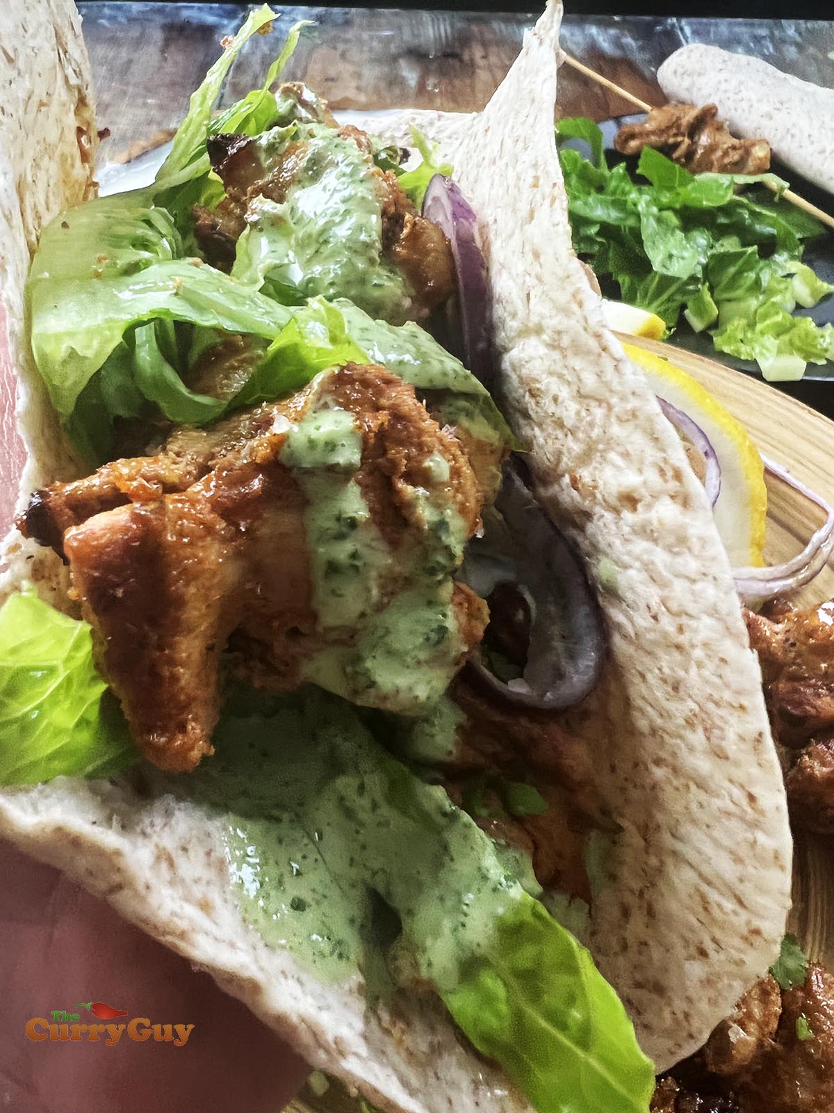 Chicken tikka wrapped into a chapatti.