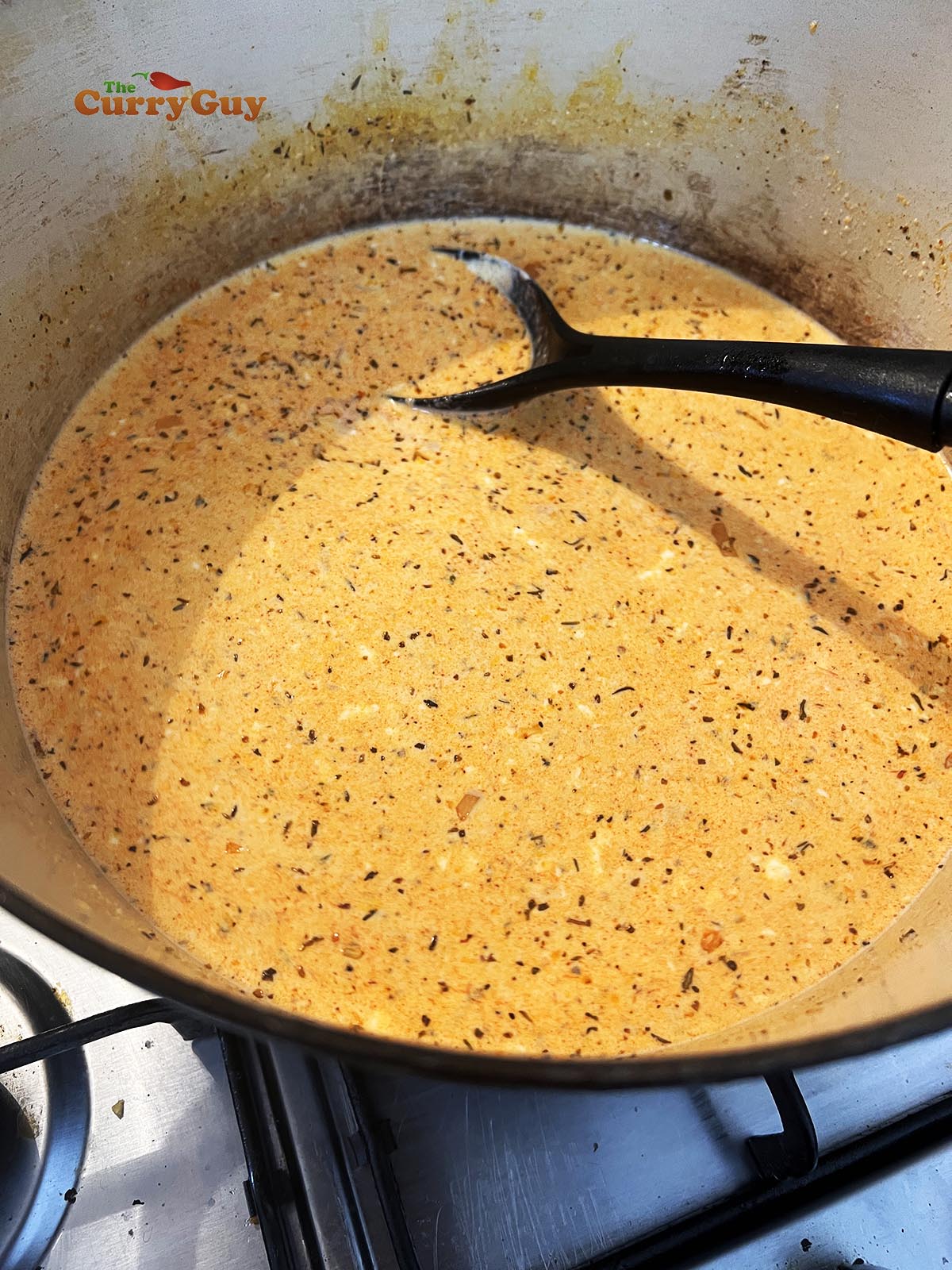 Adding cheese to the pan