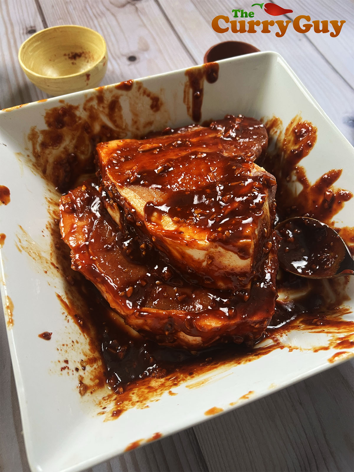 Korean pork chops resting in marinade.