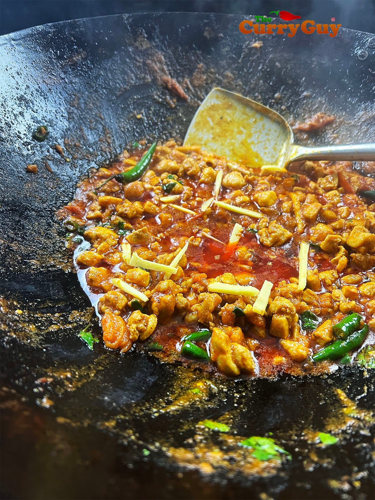 Oil rising to the top of the curry