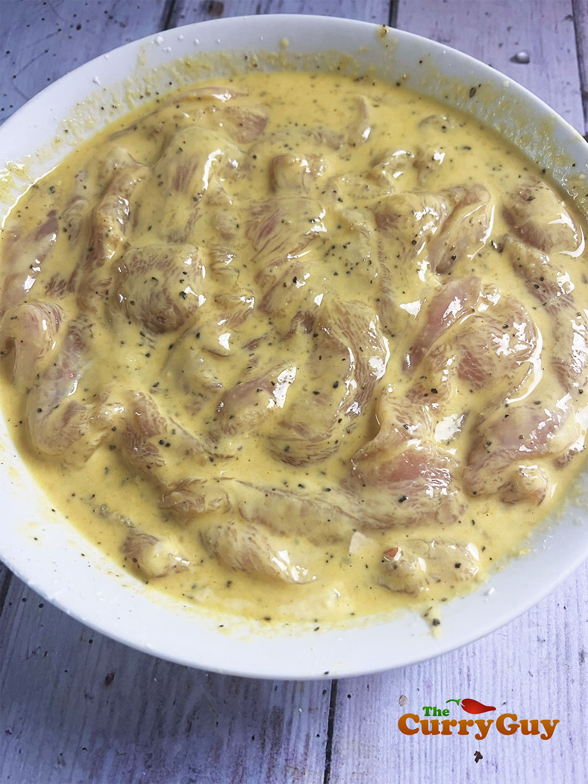 The chicken marinating