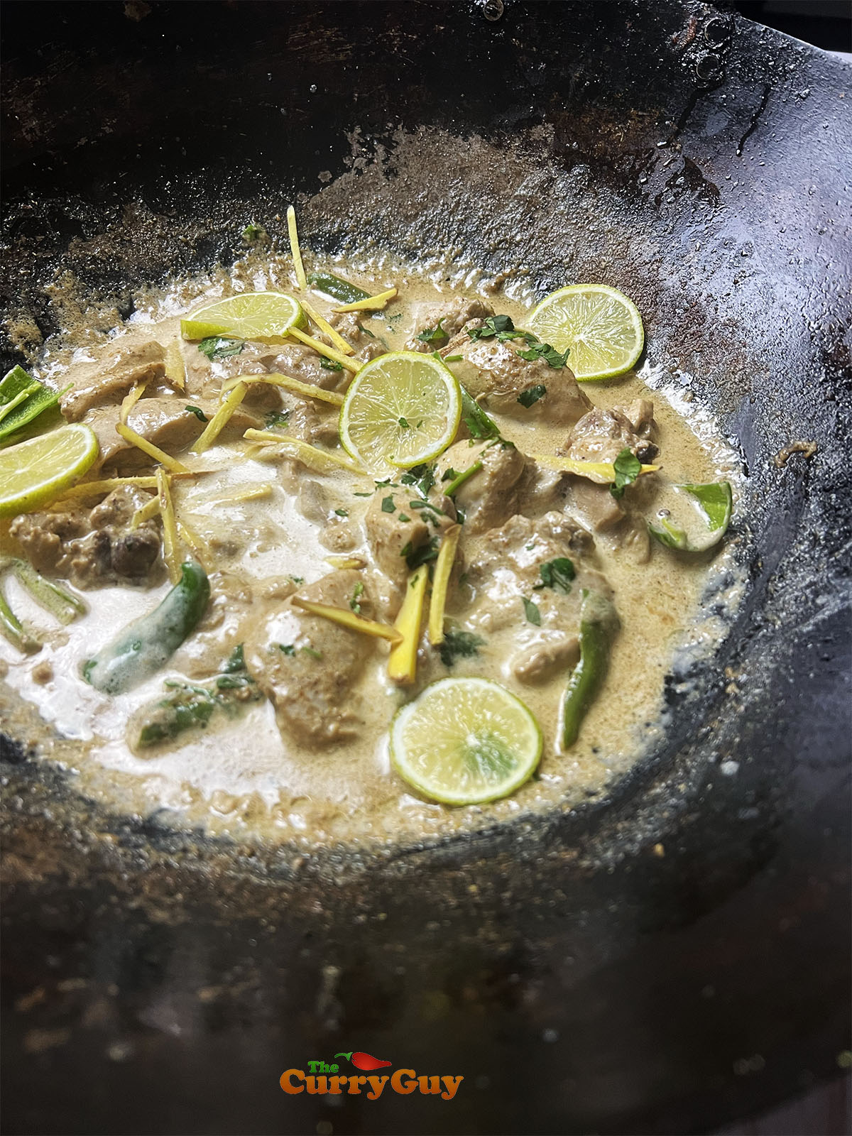 Finished white chicken karahi with garnishes
