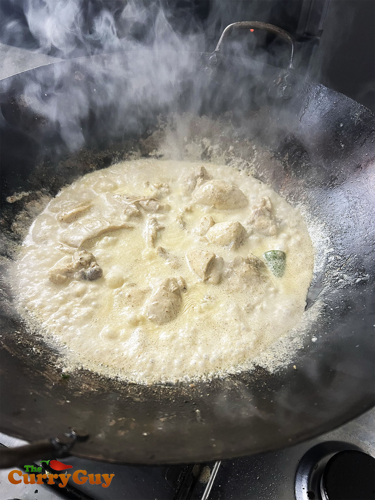 Adding the cream to the pan.