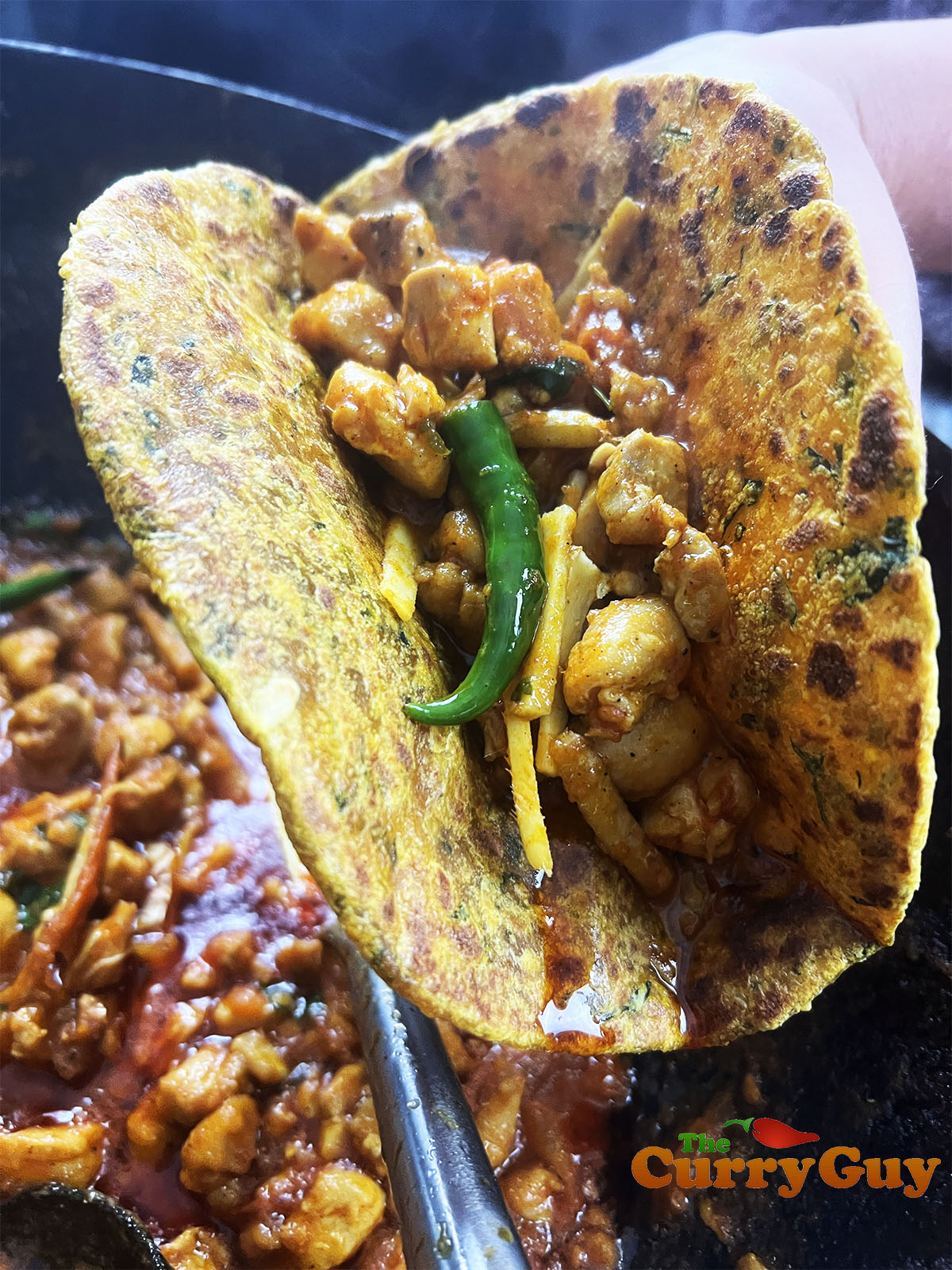 Chicken keema karahi wrapped in a chapatti
