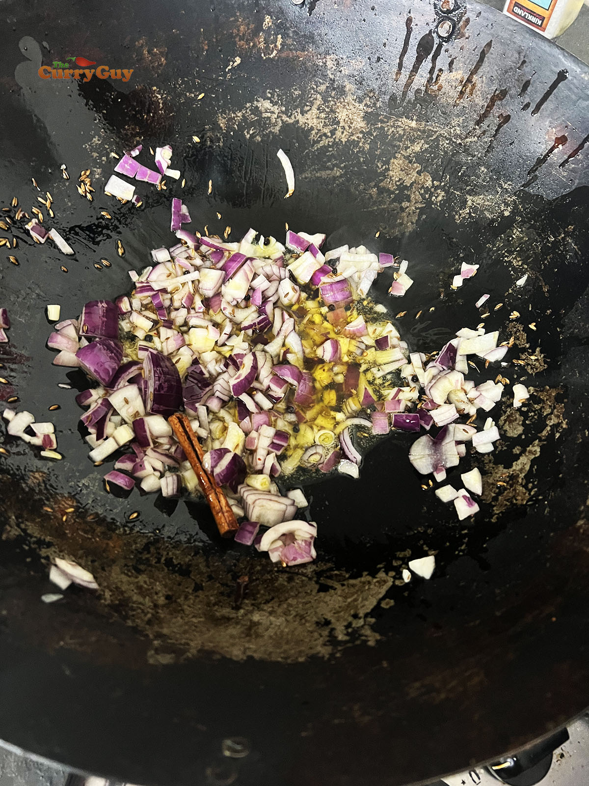 Frying the chopped onions.