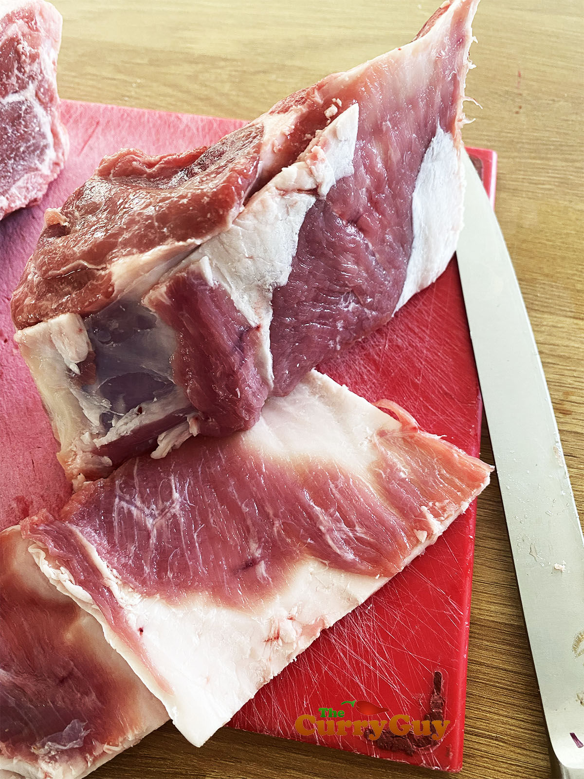 Cutting the lamb chops into double chops