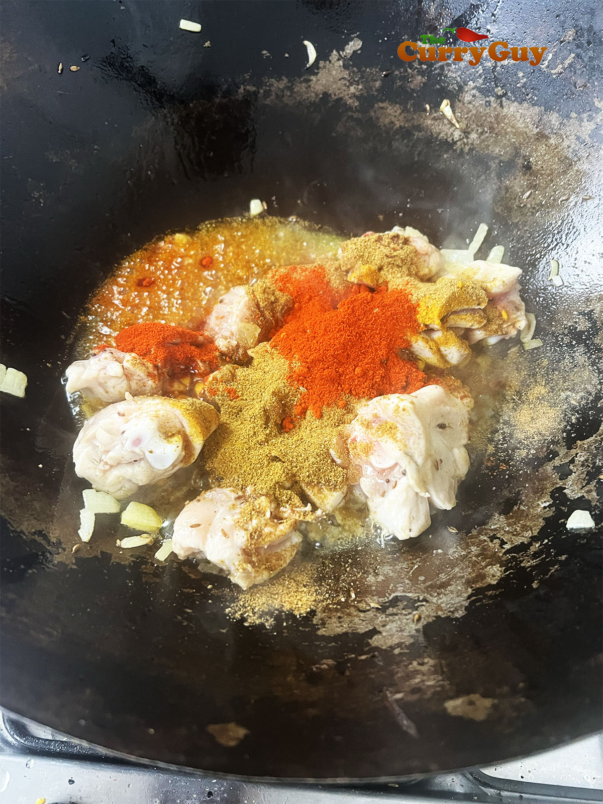 Adding the ground spices.