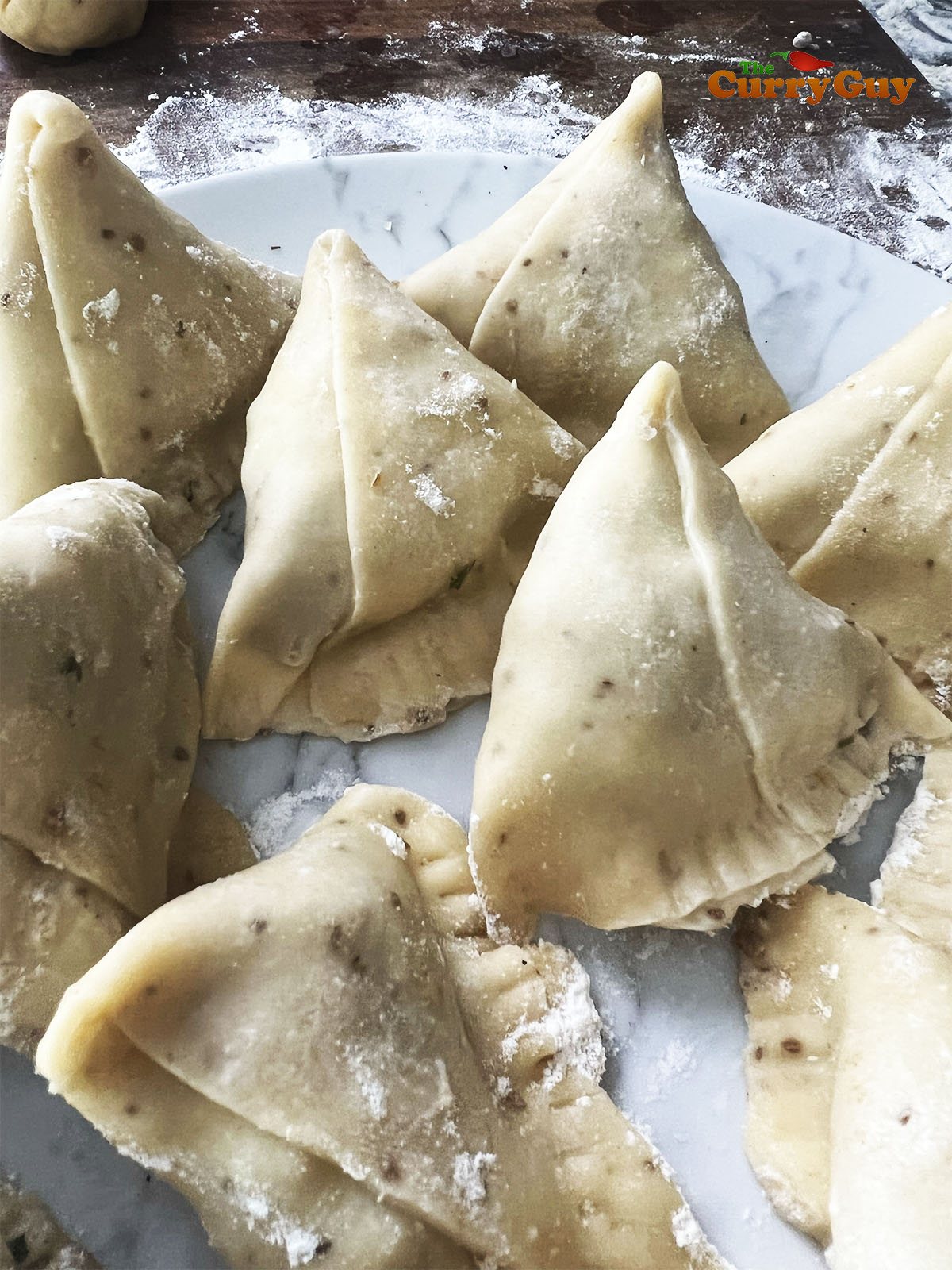 All of the folded samosas