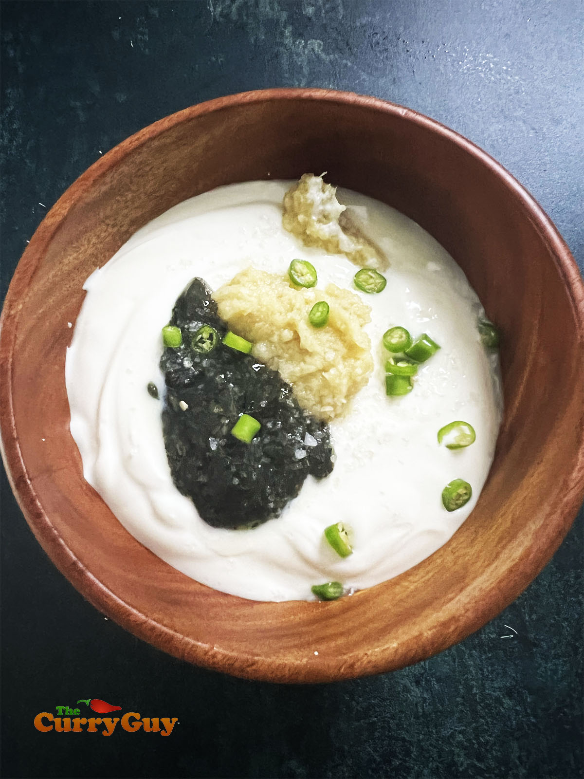 The Indian mint sauce ingredients in a bowl