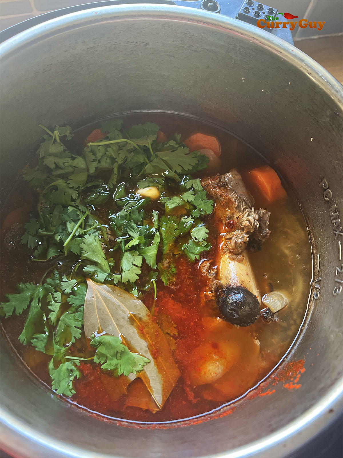 Adding the remaining lamb stock ingredients