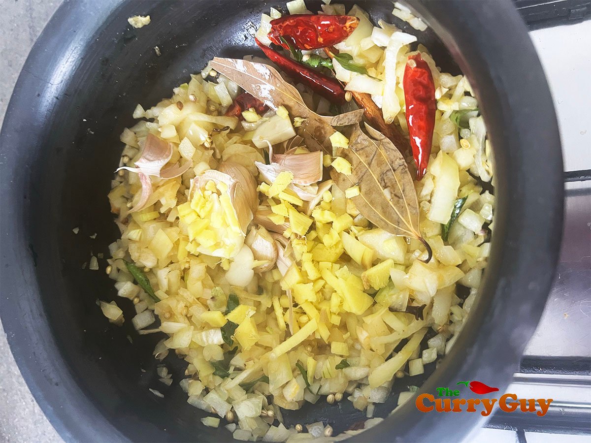 Adding the chopped onions.