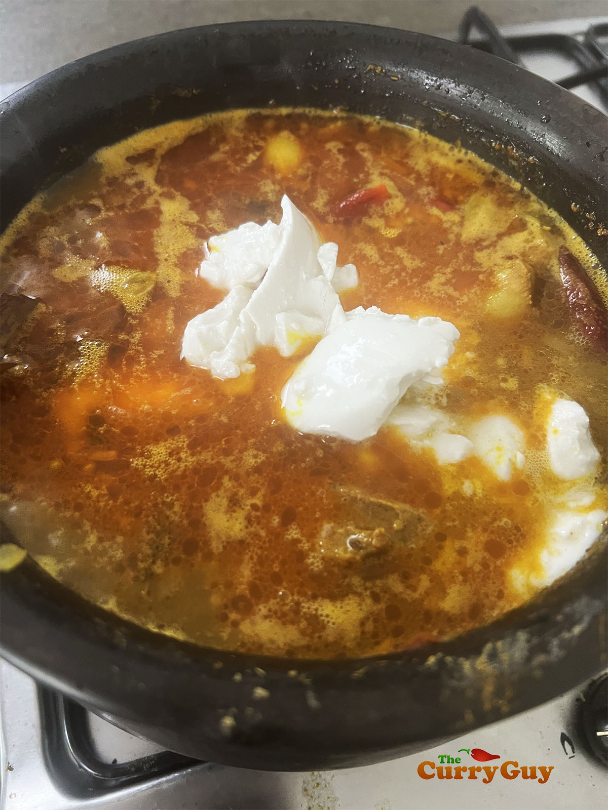 Adding the thick coconut milk