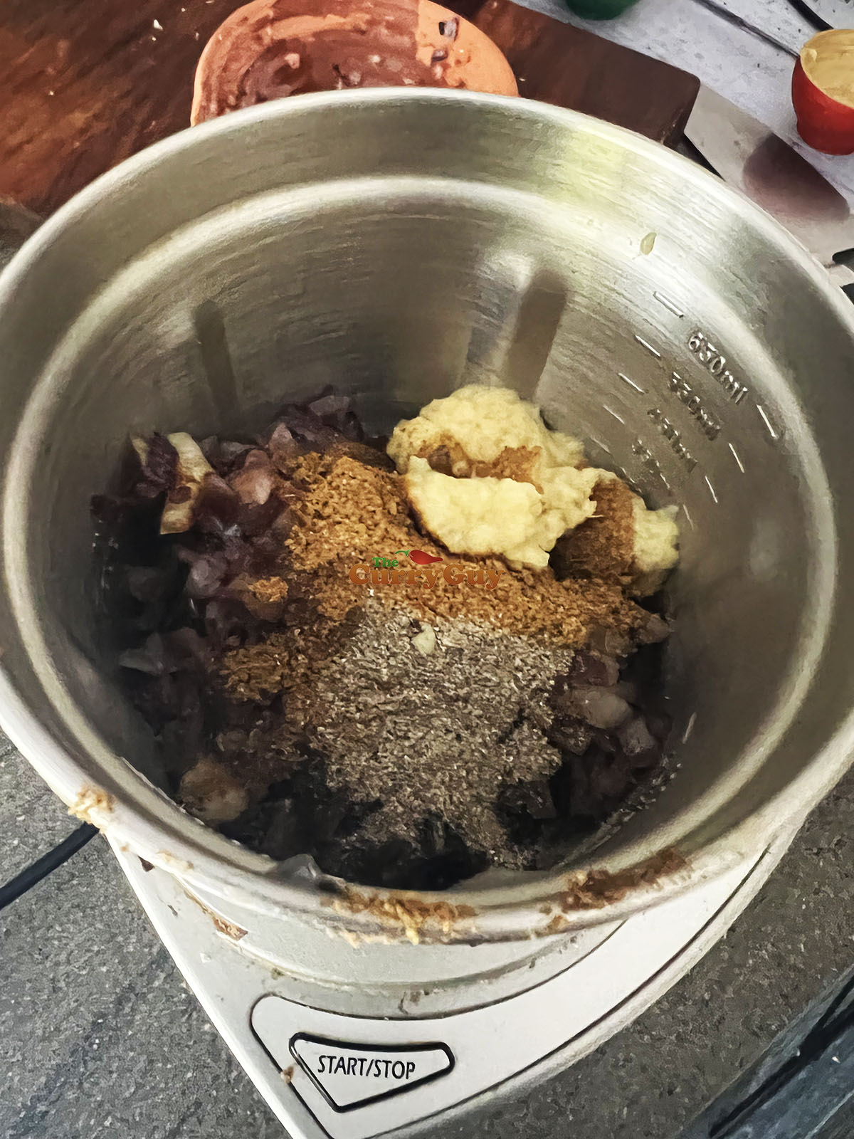 Second marinade in a food processor ready for blending to a paste.