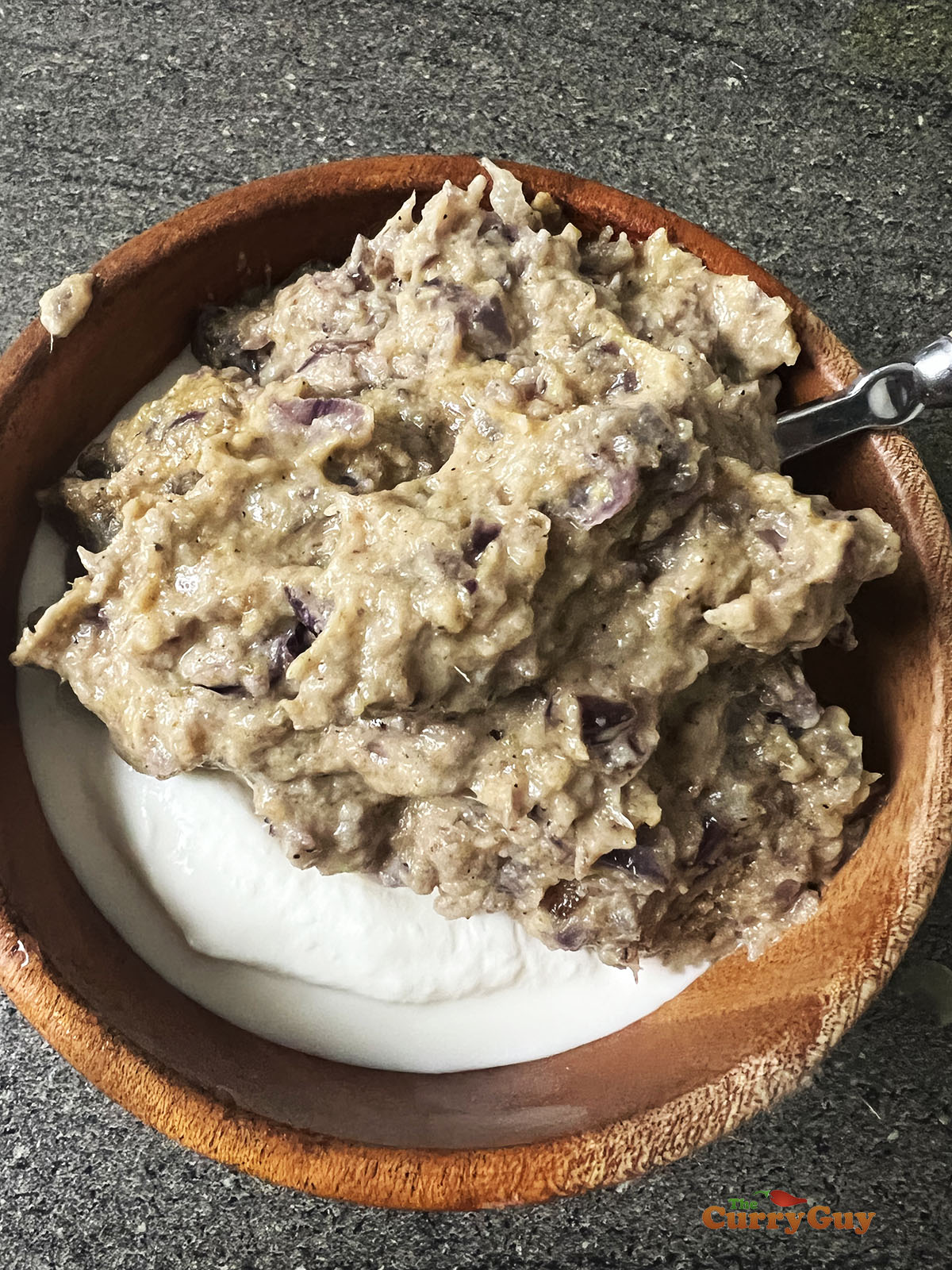 Onion paste and yoghurt ready to be whisked to make the second marinade.