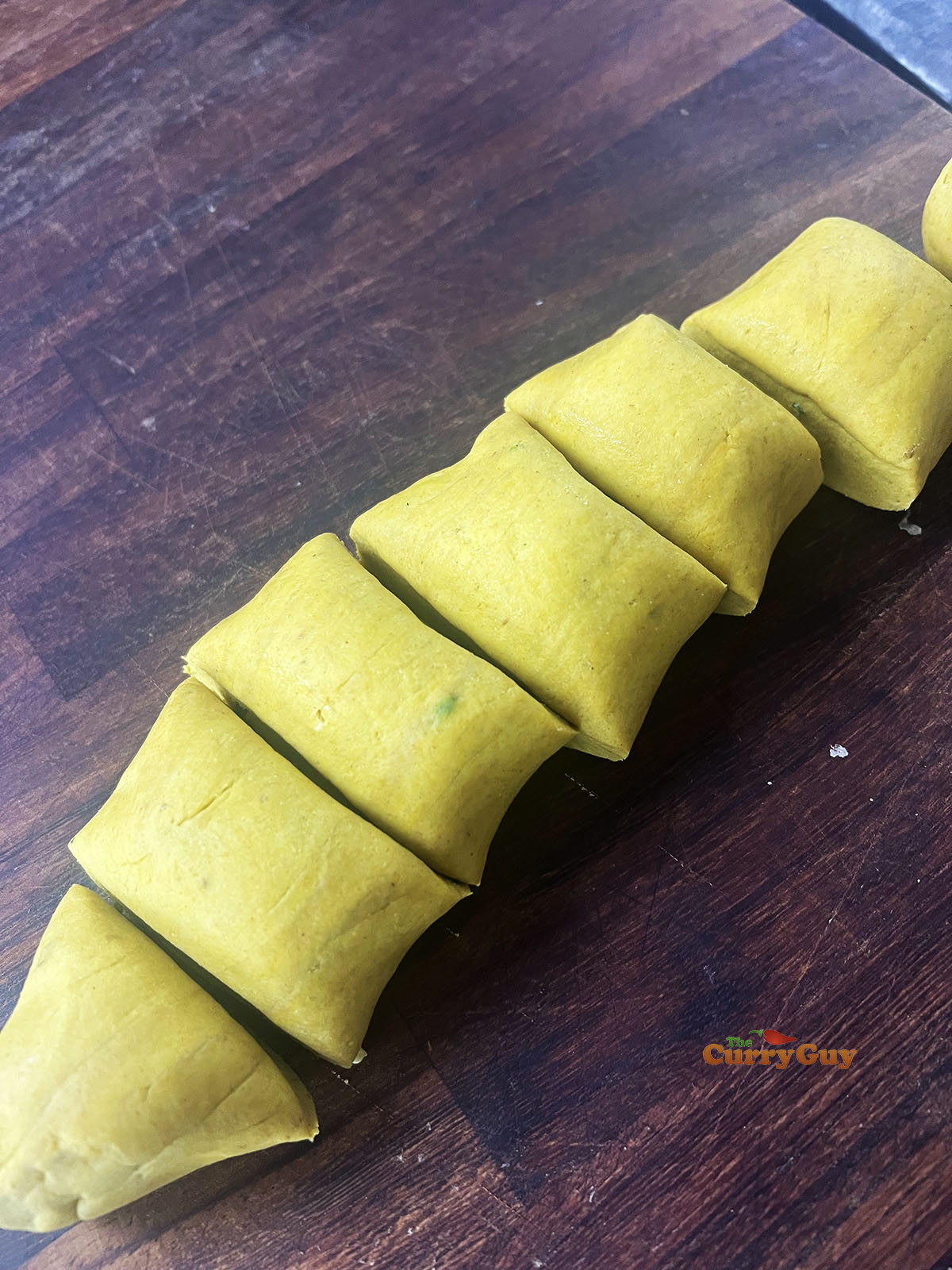 Dough rolled out into a rope shape.