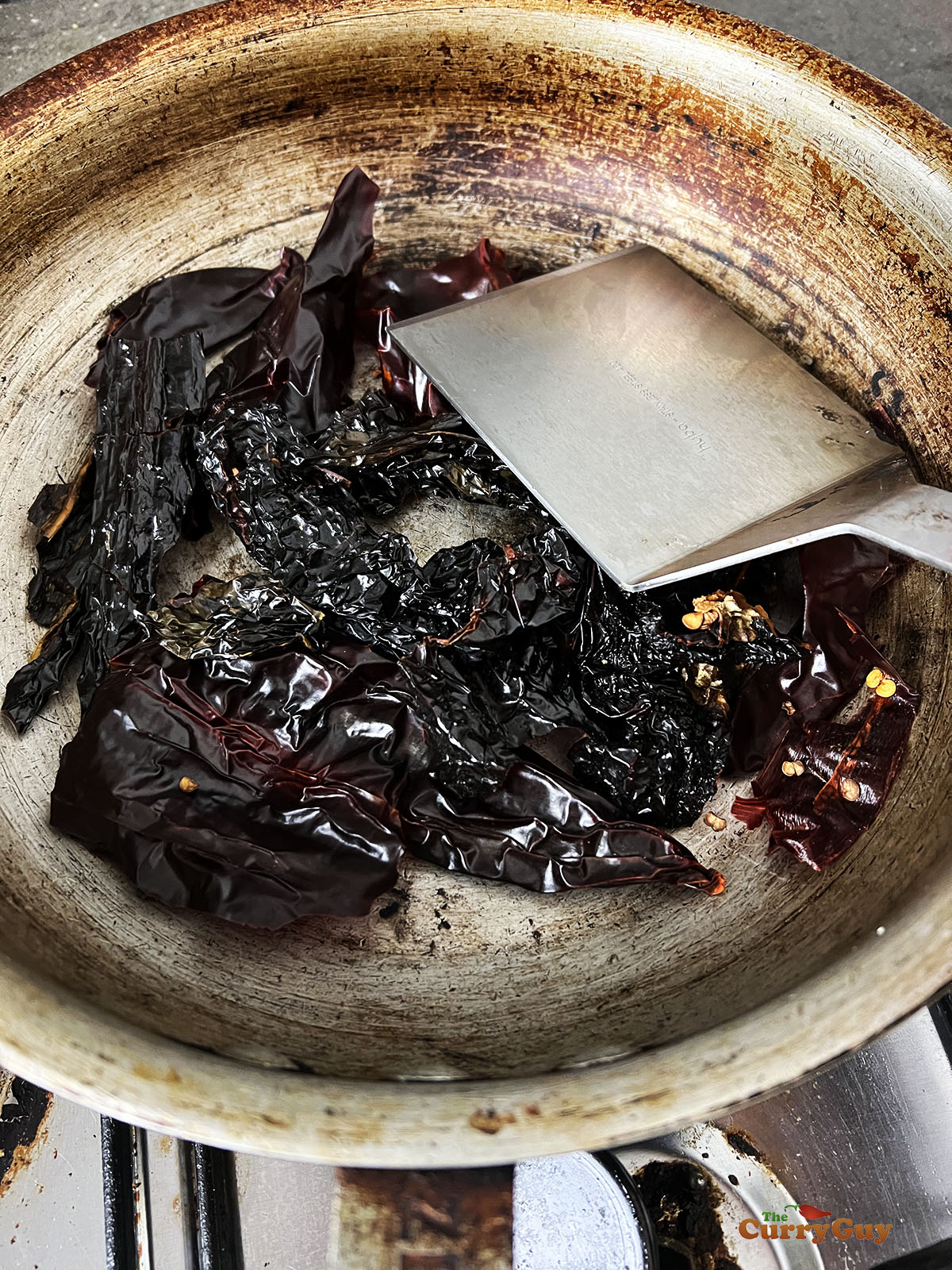 Toasting dried chilies