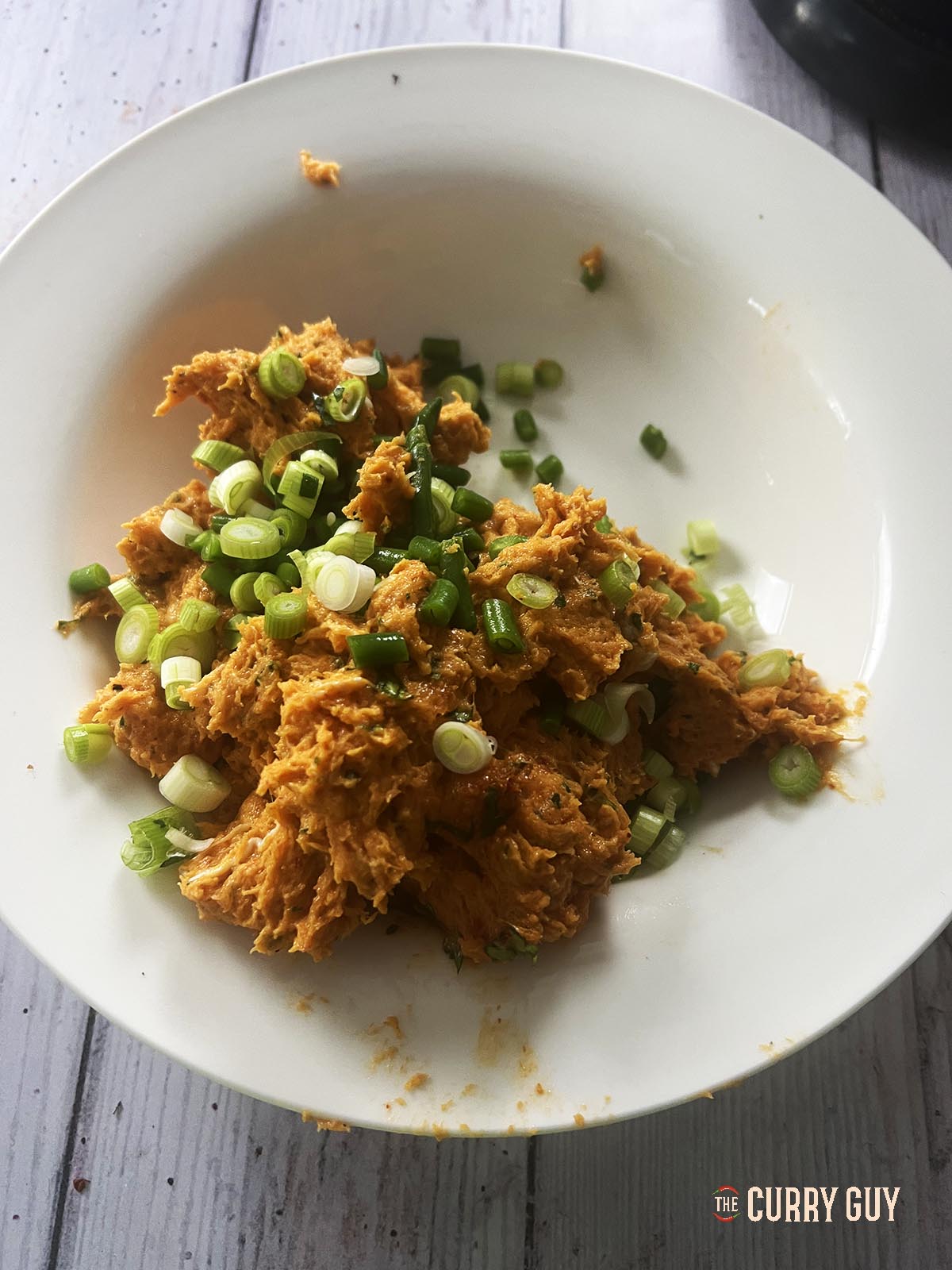 The fish paste with the spring onions and green beans in it.