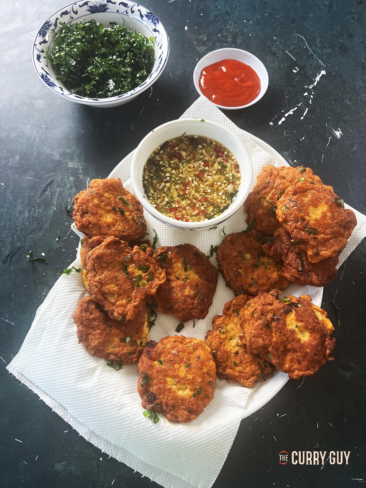 The Thai fish cakes served with a dipping sauce.