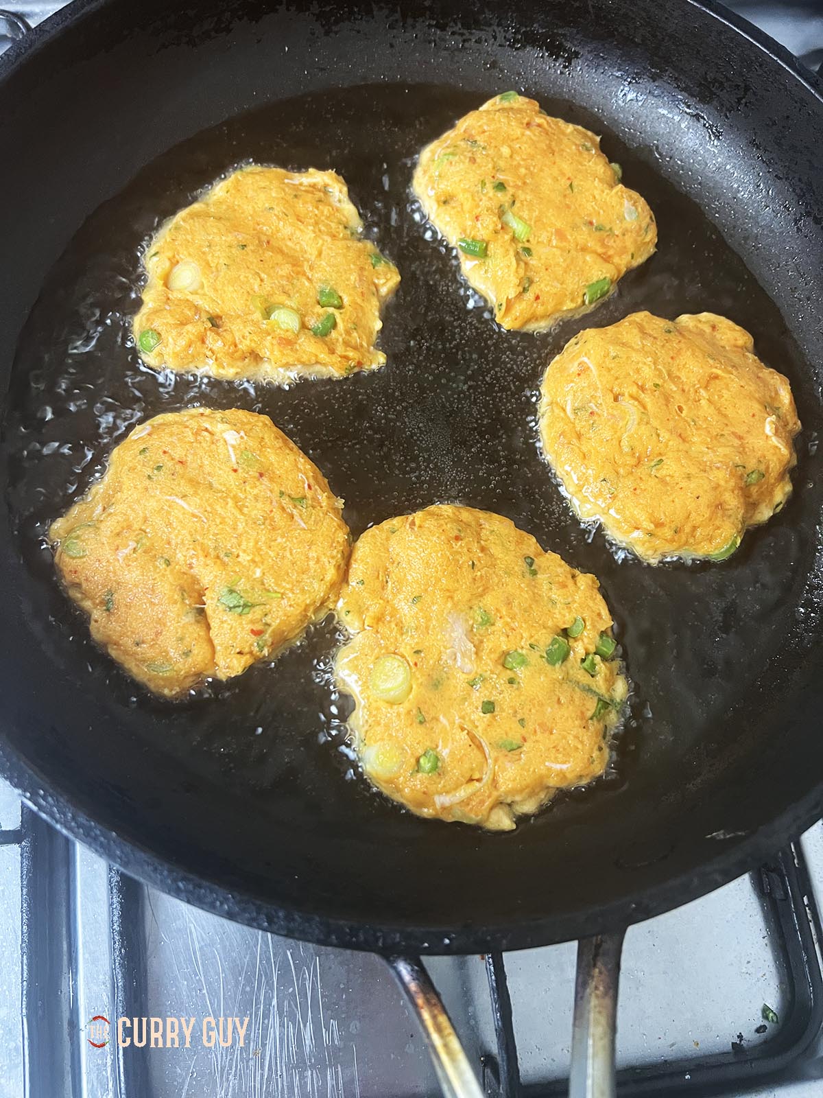 Frying the fish cakes