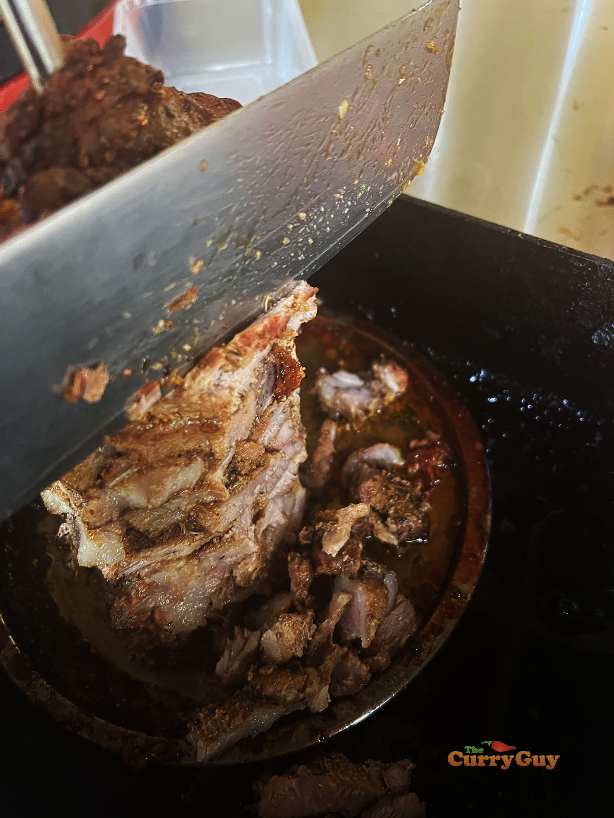 Slicing the pork Greek gyro meat