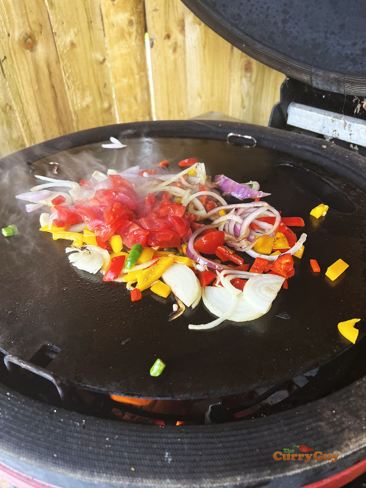 Stir frying the vegetables.