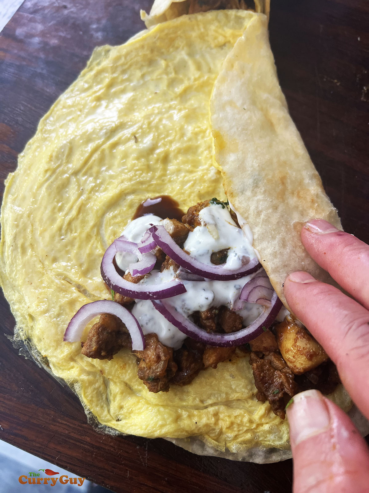 Folding a chicken frankie