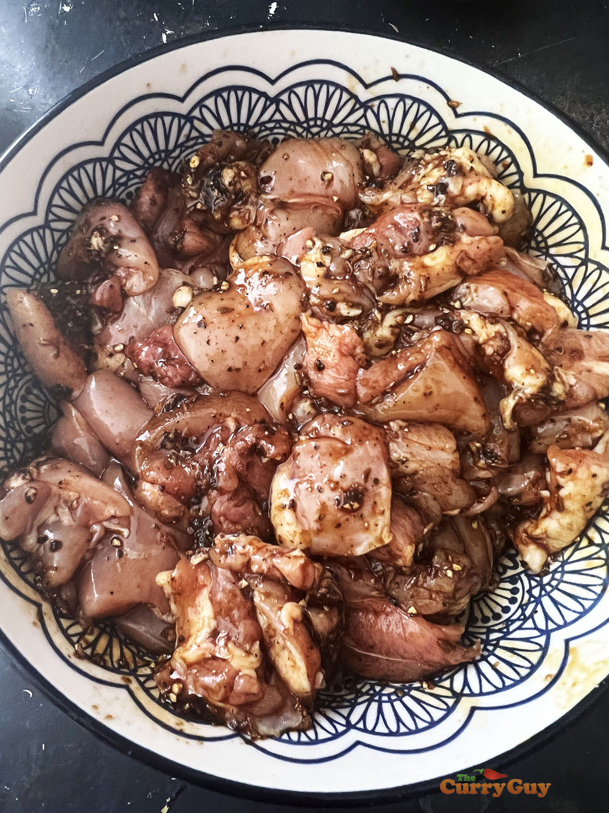 Marinating the chicken meat.