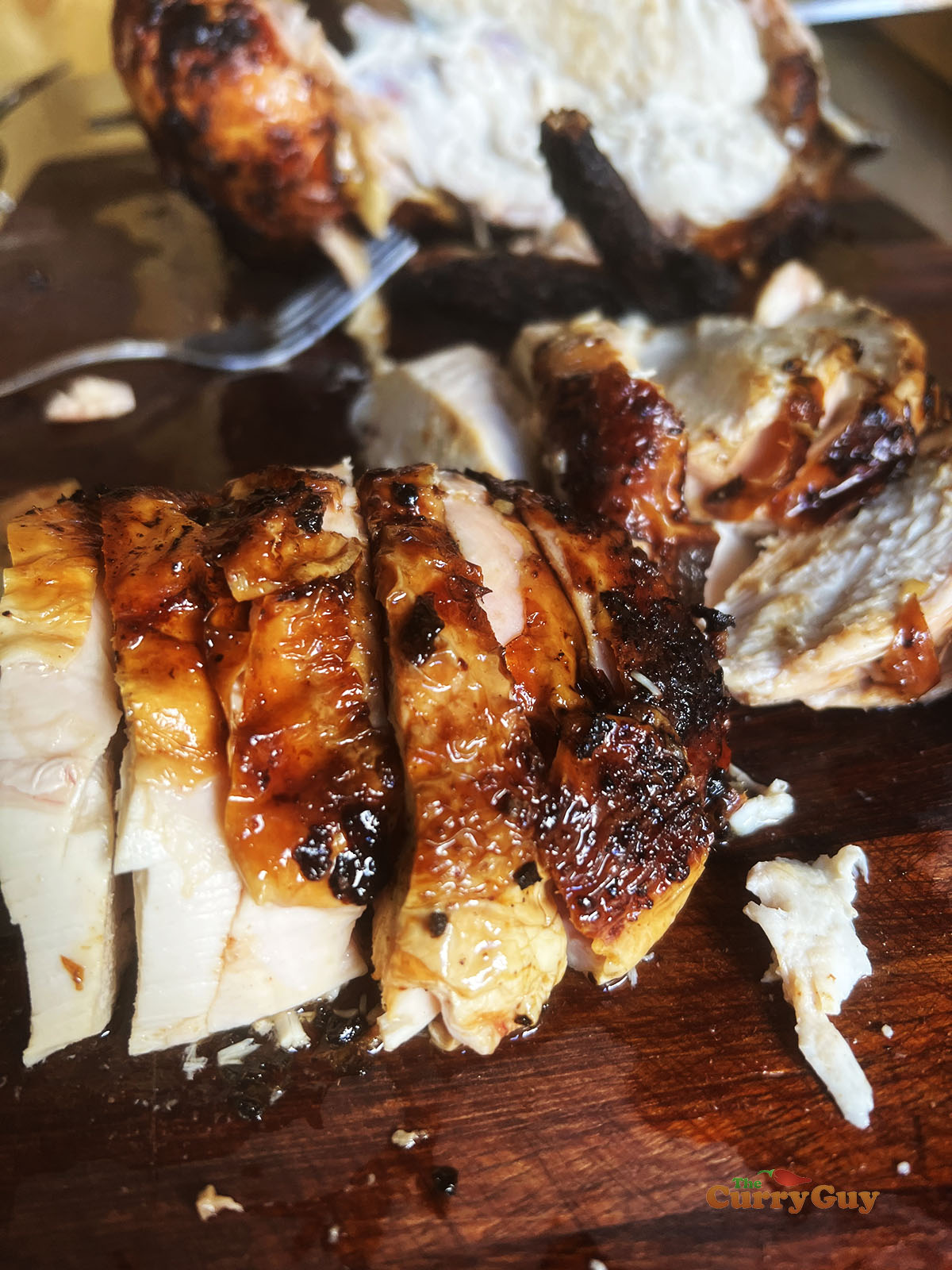 Finished chicken, carved and ready to serve.