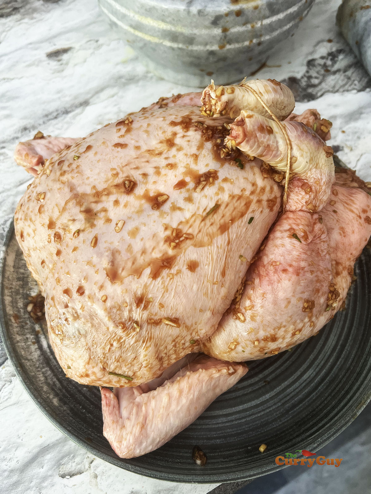 Marinating the chicken.