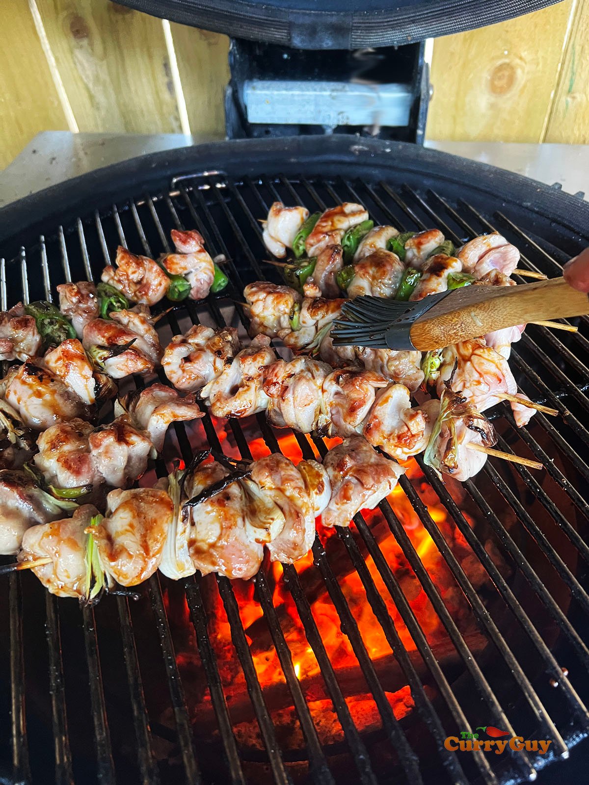 Basting the chicken.