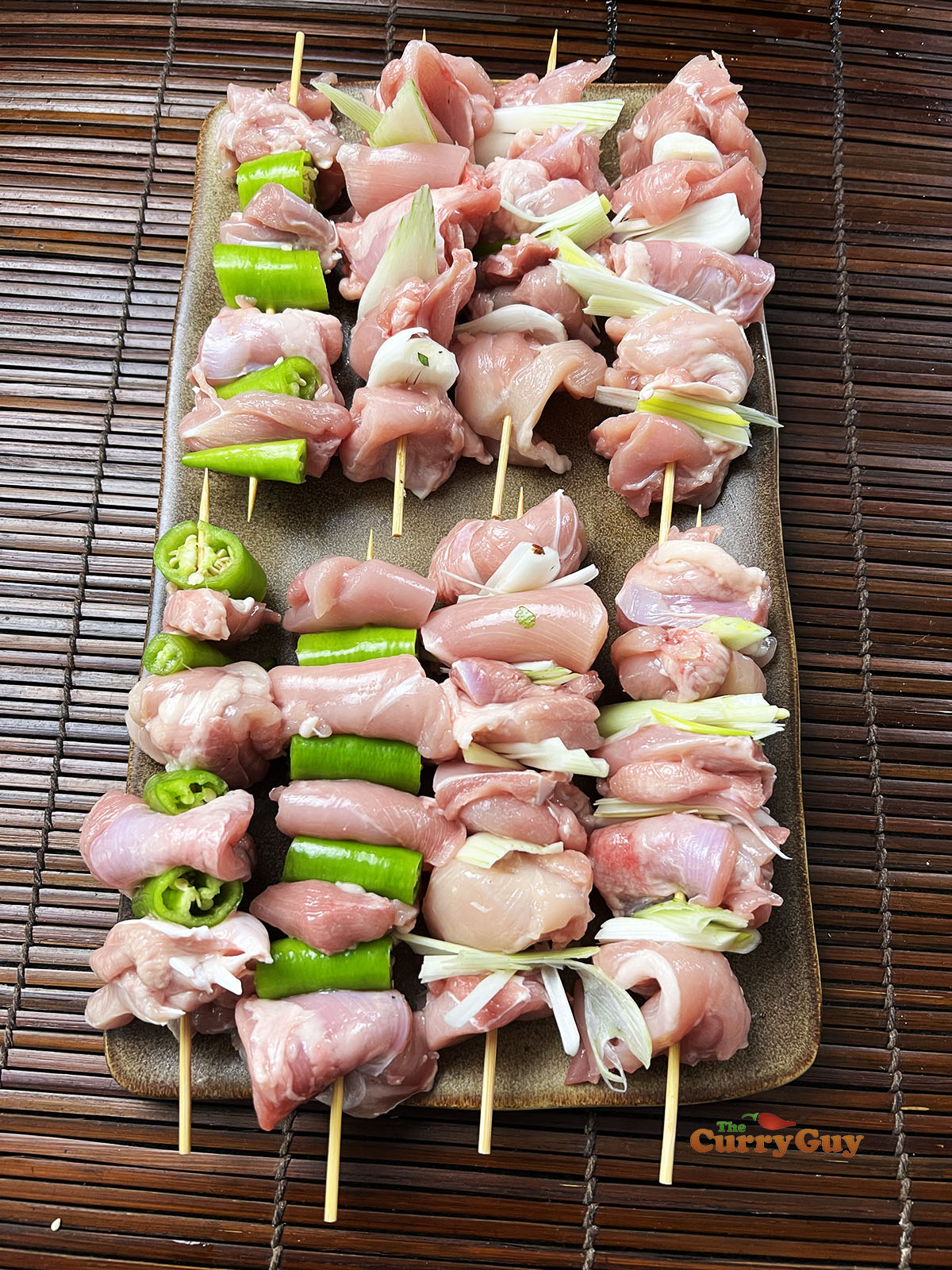 Chicken and veggies on skewers.