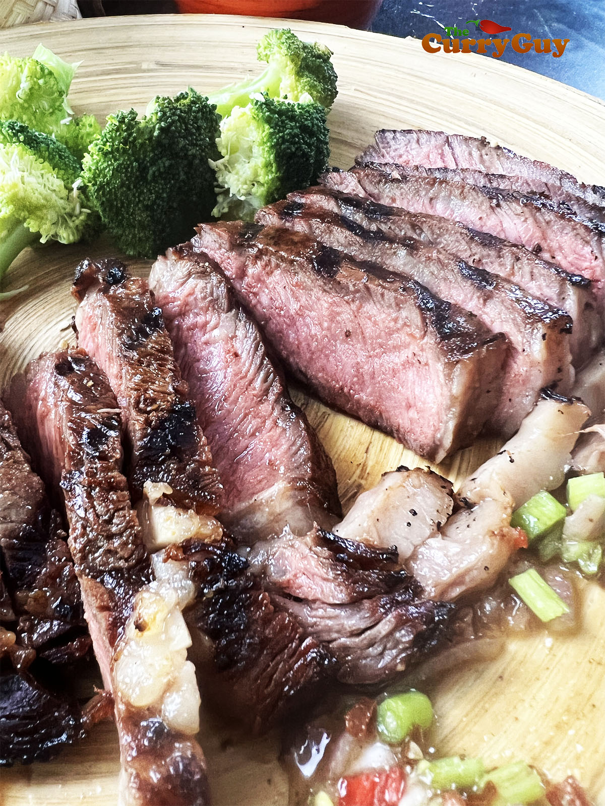 Medium rare cooked weeping tiger steaks.