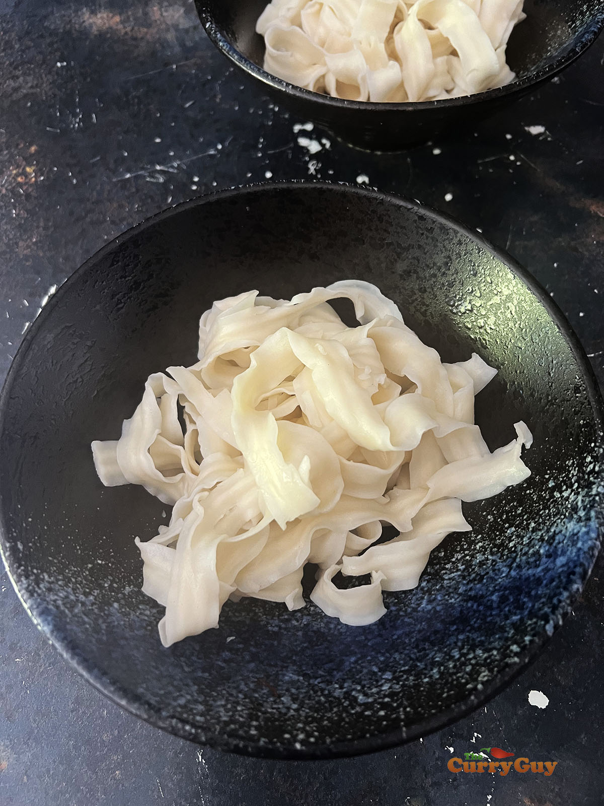 Ramen noodles in a ramen bowl.