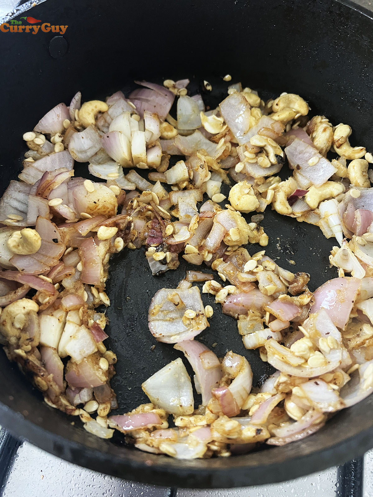 Fried onions, cashews, melon seeds, garlic and ginger.