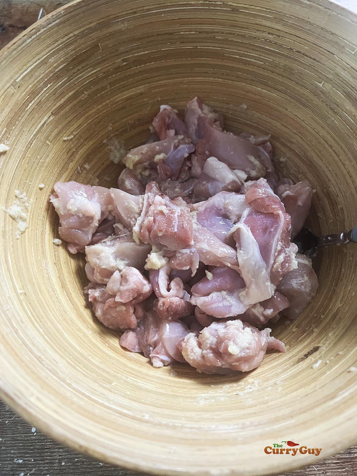 Chicken marinating in the first marinade.
