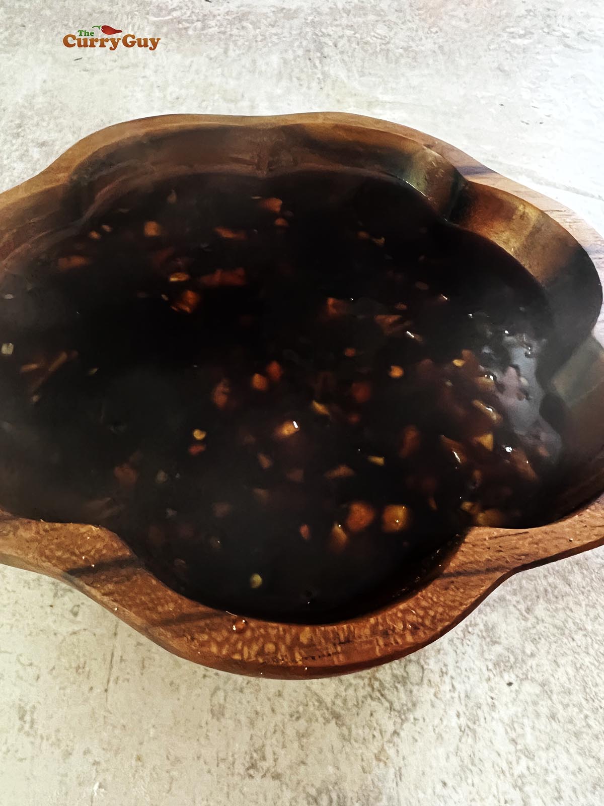 Teriyaki sauce cooling in a bowl.