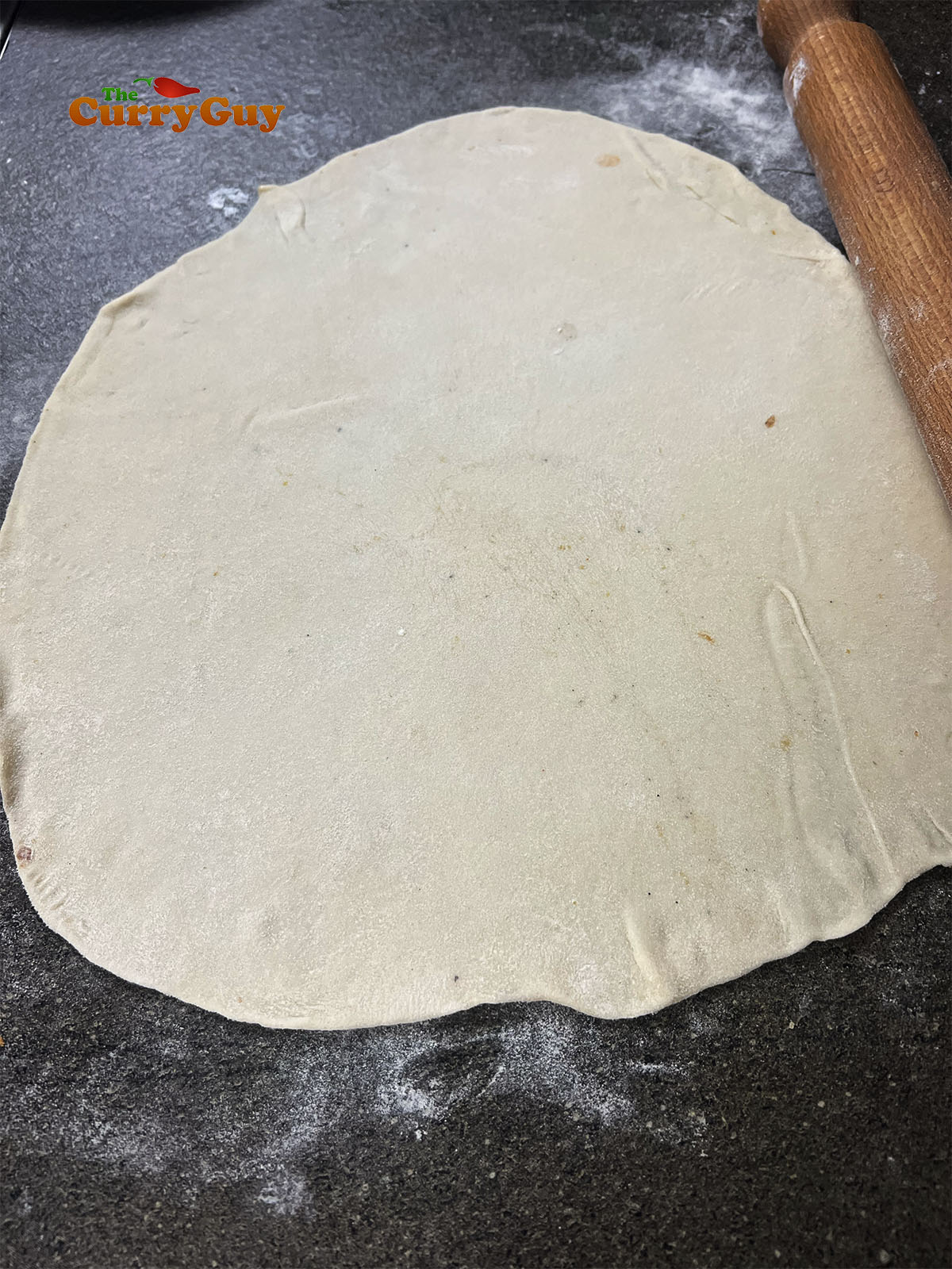 Rolling out the dough.