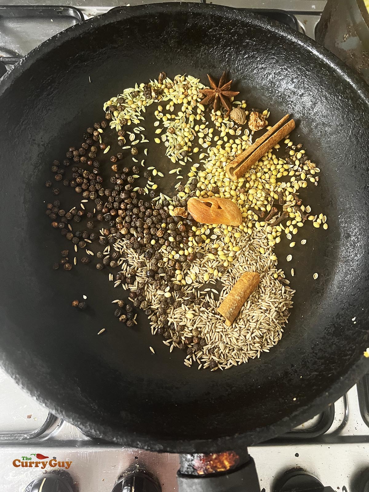 Toasting the spices for the haleem spice blend.