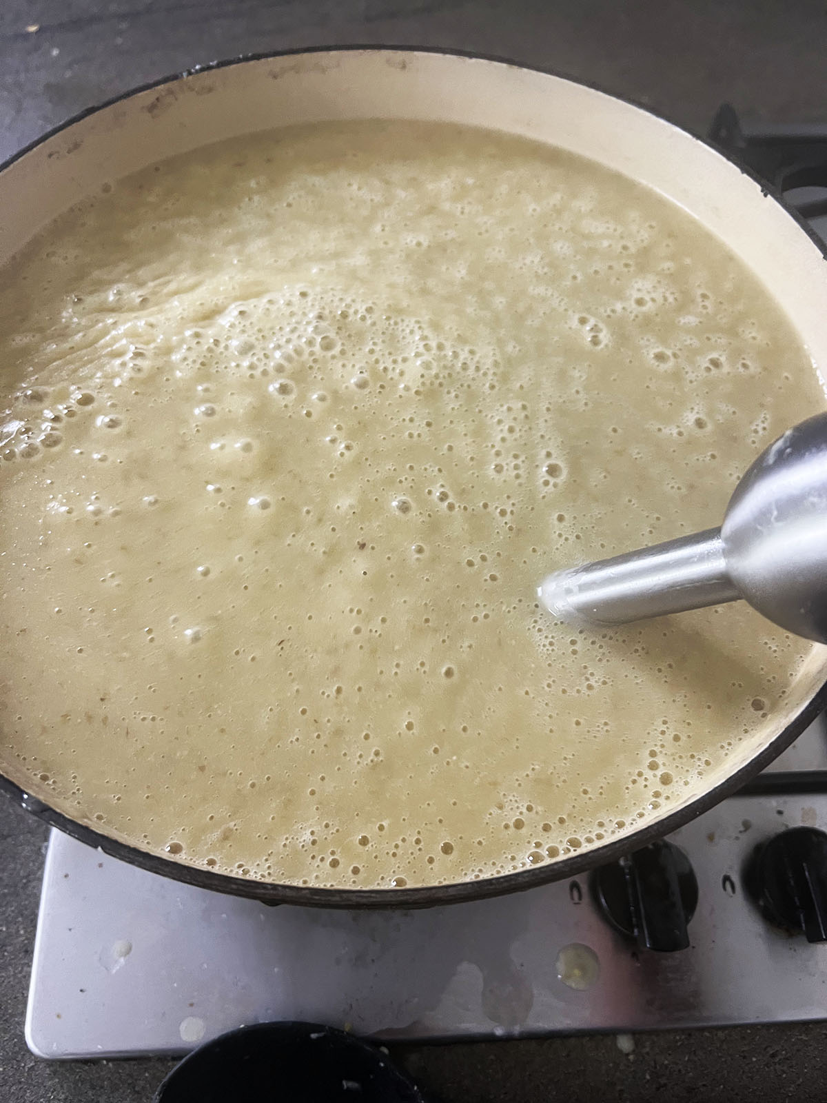 Blending the lentils and wheat.