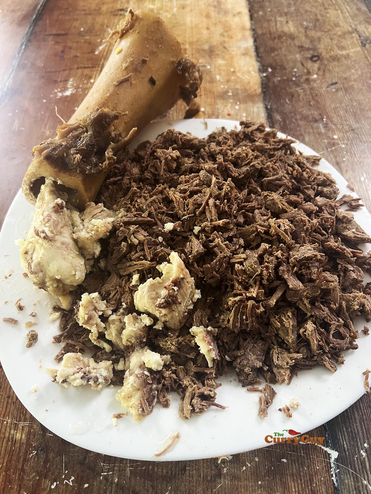 Shredded cooked beef and beef bone marrow.