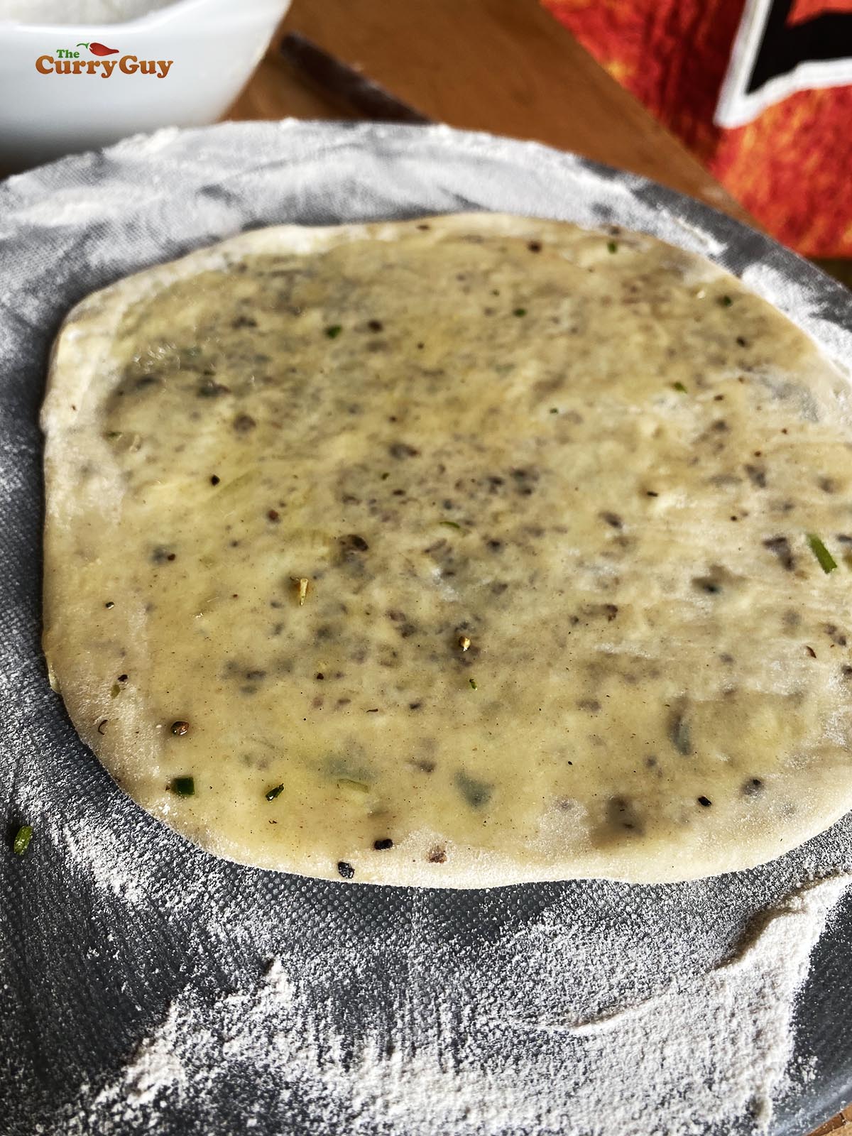 Kulcha brushed with ghee.