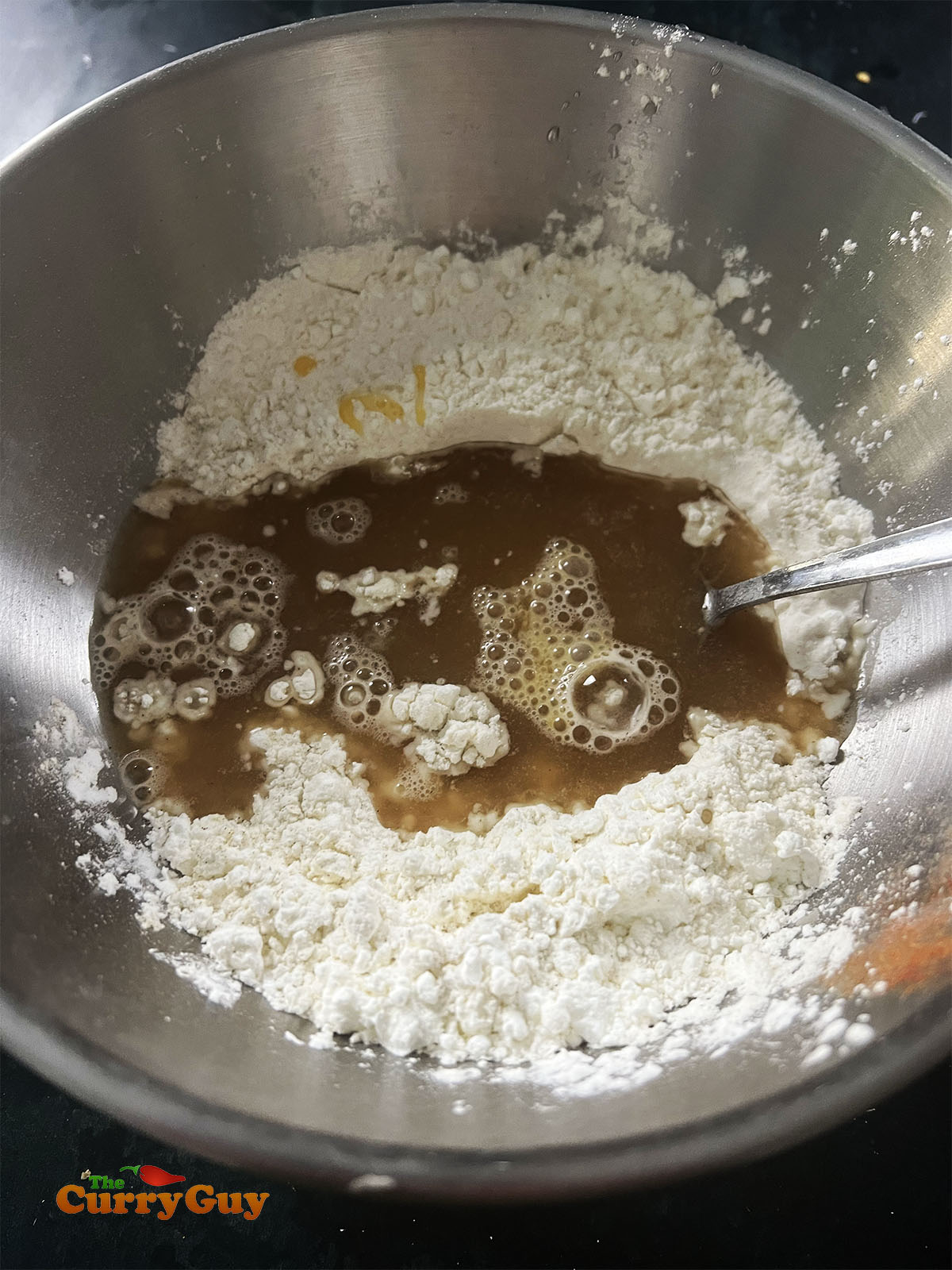 Preparing the batter for the chicken