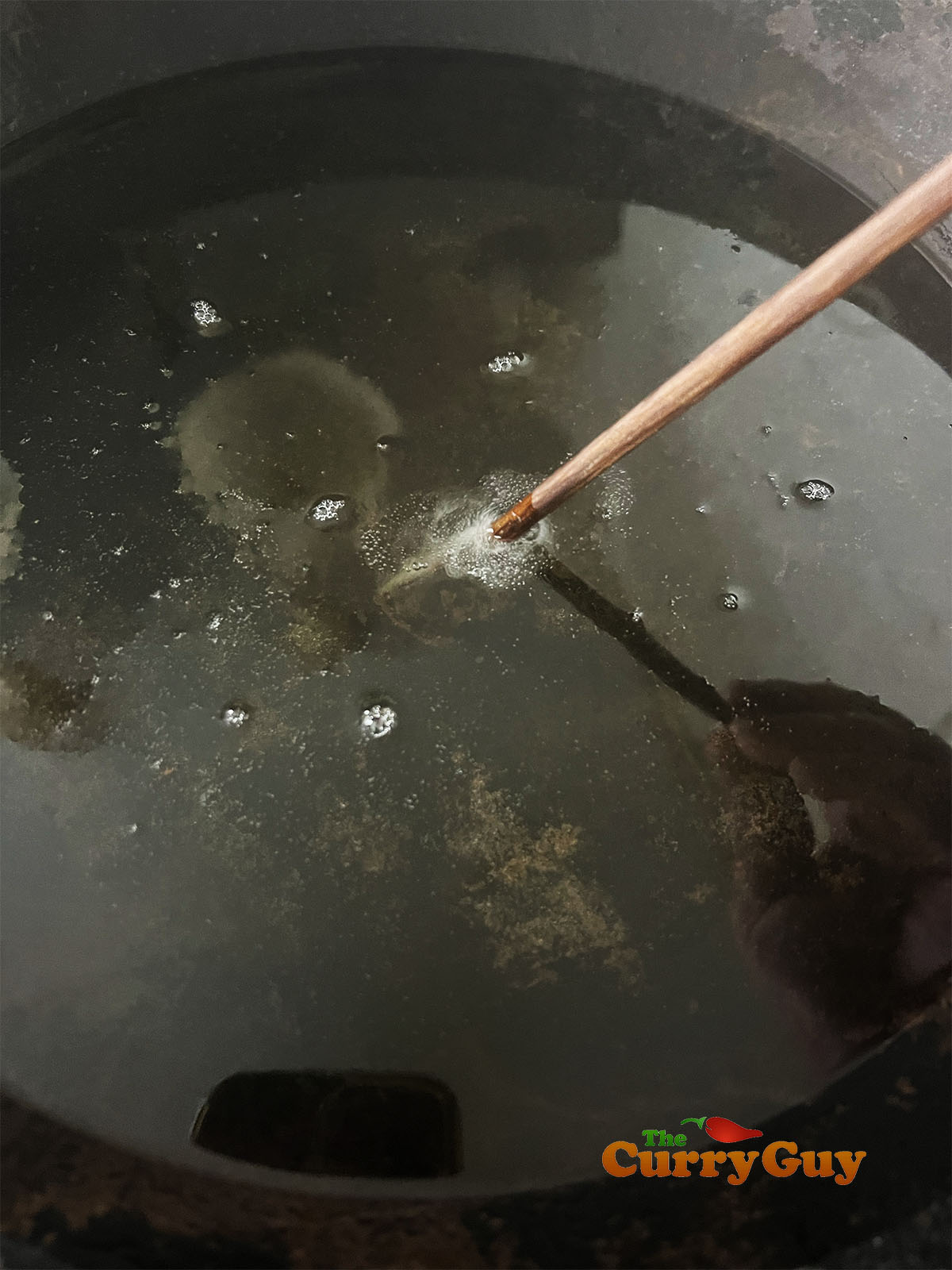 Chicken the oil temperature for frying.